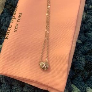 Kate Spade silver knot mini pendant necklace, never worn, with tags